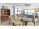 Open-concept dining area flows into a living room with stunning ocean views at 5301 S Atlantic Ave # 51, New Smyrna Beach, FL 32169
