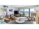 Comfortable living room offering great natural light and stunning ocean vistas at 5301 S Atlantic Ave # 51, New Smyrna Beach, FL 32169