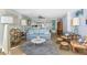 Inviting living room with bright decor and easy access to the kitchen at 5301 S Atlantic Ave # 51, New Smyrna Beach, FL 32169