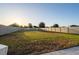 Spacious back yard with lush lawn enclosed with a solid white privacy fence at 555 Meadow Bend Dr, Davenport, FL 33837