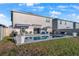 A relaxing backyard showcasing a pool, seating, and a grill perfect for entertaining or unwinding at 555 Meadow Bend Dr, Davenport, FL 33837