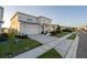 A two-story house is featured with a large driveway, a two-car garage, and neatly arranged landscaping at 555 Meadow Bend Dr, Davenport, FL 33837
