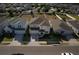 A well-maintained two-story home with a manicured lawn and a two-car garage in a suburban neighborhood at 555 Meadow Bend Dr, Davenport, FL 33837