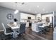 Open concept kitchen and dining area, perfect for entertaining with stainless steel appliances at 555 Meadow Bend Dr, Davenport, FL 33837