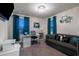 Bright office space featuring natural lighting, comfortable sofa seating, and modern decor at 555 Meadow Bend Dr, Davenport, FL 33837