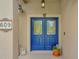 Close-up featuring the home's front door, with glass detailing, and house number at 609 Westview Dr, Minneola, FL 34715