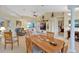 Open-concept living area connecting kitchen, dining, and sitting areas for modern living at 609 Westview Dr, Minneola, FL 34715