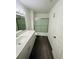 Contemporary bathroom featuring sleek design elements and a well-lit vanity area at 6328 Raleigh St # 816, Orlando, FL 32835