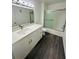 Updated bathroom featuring a modern vanity, stylish fixtures, and a shower-tub combination at 6328 Raleigh St # 816, Orlando, FL 32835