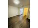 Cozy bedroom featuring wood floors and easy access to bathroom and closet at 6328 Raleigh St # 816, Orlando, FL 32835