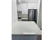 Modern kitchen featuring stylish countertops, stainless steel appliances, and updated cabinets at 6328 Raleigh St # 816, Orlando, FL 32835
