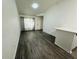 Open living room featuring wood floors and natural light at 6328 Raleigh St # 816, Orlando, FL 32835