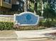 Stone community sign with beautiful tile work at 6328 Raleigh St # 816, Orlando, FL 32835