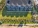 Aerial view showcasing the manicured lawn of the condo complex at 7 Marden Dr, Ormond Beach, FL 32176