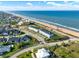 Picturesque coastal community featuring charming homes, direct beach access, and a serene ocean backdrop at 7 Marden Dr, Ormond Beach, FL 32176