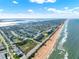 Amazing aerial perspective of coastal living, with homes nestled between ocean beaches and tranquil river views at 7 Marden Dr, Ormond Beach, FL 32176