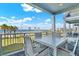 Balcony with a table and seating, with a ocean view at 7 Marden Dr, Ormond Beach, FL 32176