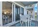 Balcony with outdoor seating overlooking the interior of the home at 7 Marden Dr, Ormond Beach, FL 32176