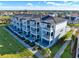 Stunning multi-story condo complex with private balconies and manicured landscaping showcasing coastal living at 7 Marden Dr, Ormond Beach, FL 32176