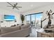 Bright living room with sliding glass doors leading to a balcony overlooking the ocean at 7 Marden Dr, Ormond Beach, FL 32176