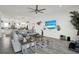 Open-concept living room with coastal decor and access to the kitchen at 7 Marden Dr, Ormond Beach, FL 32176
