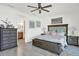 Spacious bedroom featuring tasteful decor, and an ensuite bathroom for convenience at 7 Marden Dr, Ormond Beach, FL 32176
