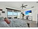 Bright and spacious main bedroom with ocean views and a ceiling fan at 7 Marden Dr, Ormond Beach, FL 32176