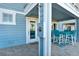 An outdoor shower with a light-blue accent is conveniently located right off the patio at 7 Marden Dr, Ormond Beach, FL 32176
