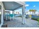 Covered outdoor patio area complete with ocean views and outdoor seating at 7 Marden Dr, Ormond Beach, FL 32176
