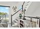 Bright staircase with dark accents and ocean views provides a modern feel at 7 Marden Dr, Ormond Beach, FL 32176