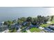 Lakefront homes with private docks and lush landscaping, offering stunning waterfront living at 7046 Treasure Island Rd, Leesburg, FL 34788