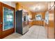 Traditional kitchen with stainless steel appliances, tile flooring, and ample cabinet space for storage and convenience at 7046 Treasure Island Rd, Leesburg, FL 34788
