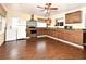 Spacious kitchen with stainless steel appliances, wood cabinets, and granite countertops at 7407 Country Run Pkwy, Orlando, FL 32818