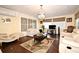 Well lit living room with chandelier and hardwood floors at 7407 Country Run Pkwy, Orlando, FL 32818