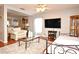Inviting living room with a large TV, comfortable seating, and stylish decor at 7407 Country Run Pkwy, Orlando, FL 32818