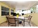 Covered patio featuring outdoor seating and dining area, perfect for enjoying the outdoors at 7407 Country Run Pkwy, Orlando, FL 32818