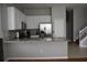 Updated kitchen with granite countertops, stainless appliances, and an open design at 7508 Lake Marsha Dr, Orlando, FL 32819
