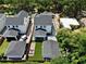 A bird's-eye view of the property showcasing the backyard, hardscaping, and neighboring homes at 833 Dartmouth St, Orlando, FL 32804