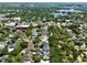 An aerial view demonstrating the property's desirable location, nestled amongst mature trees in a quiet residential neighborhood at 833 Dartmouth St, Orlando, FL 32804