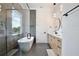 Bright bathroom with modern fixtures, soaking tub, gray tile, and double vanity at 833 Dartmouth St, Orlando, FL 32804