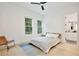Bright bedroom offers ample natural light, hardwood floors and an attached bath for easy accessibility at 833 Dartmouth St, Orlando, FL 32804
