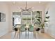 Bright dining room offers modern lighting and sliding glass doors to outdoor entertaining area at 833 Dartmouth St, Orlando, FL 32804