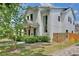 Contemporary home with stone accents, lush landscaping, and a mix of modern and classic architectural elements at 833 Dartmouth St, Orlando, FL 32804