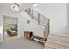 Bright foyer showcasing modern design with sleek staircase, stylish lighting, and elegant flooring at 833 Dartmouth St, Orlando, FL 32804