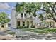 Beautiful two-story home showcasing a brick driveway and inviting curb appeal at 833 Dartmouth St, Orlando, FL 32804