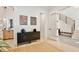 Inviting hallway with stylish decor, leading to a bright staircase and featuring modern accents and ample natural light at 833 Dartmouth St, Orlando, FL 32804