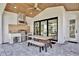 An inviting outdoor kitchen with stainless steel appliances and a wooden table, perfect for al fresco dining at 833 Dartmouth St, Orlando, FL 32804