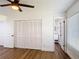 This bedroom features hardwood floors and a closet at 857 E Flag Ln, Kissimmee, FL 34759