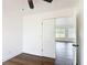 Spacious bedroom featuring bright natural lighting and wood floors at 857 E Flag Ln, Kissimmee, FL 34759