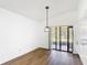 Open dining area featuring modern flooring and sliding patio doors at 857 E Flag Ln, Kissimmee, FL 34759